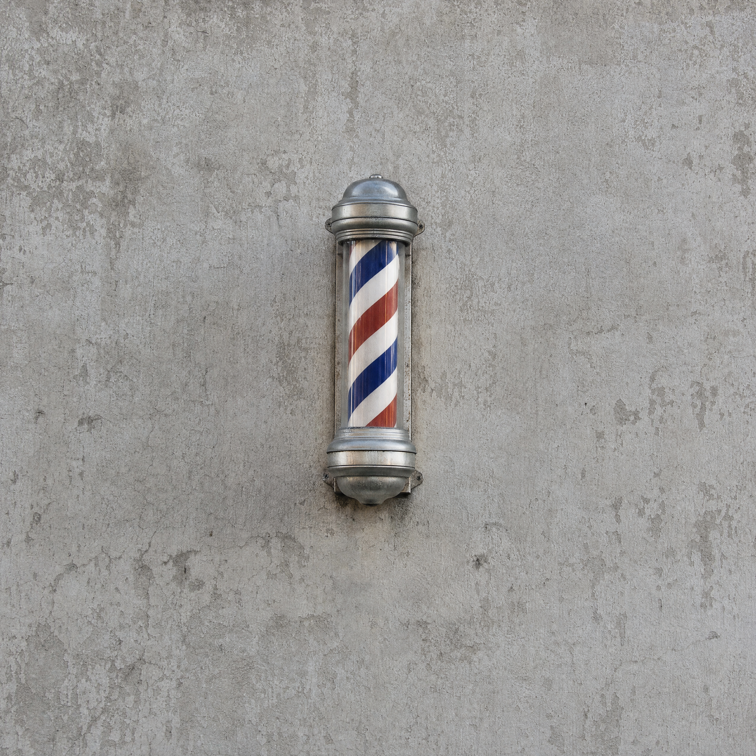 Poste de barbearia na parede